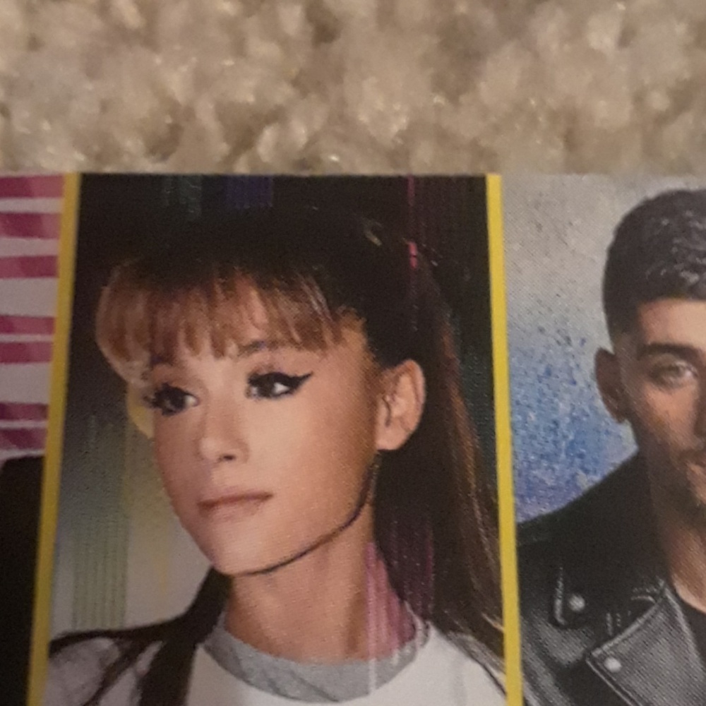 A magazine with Ariana Grande in it